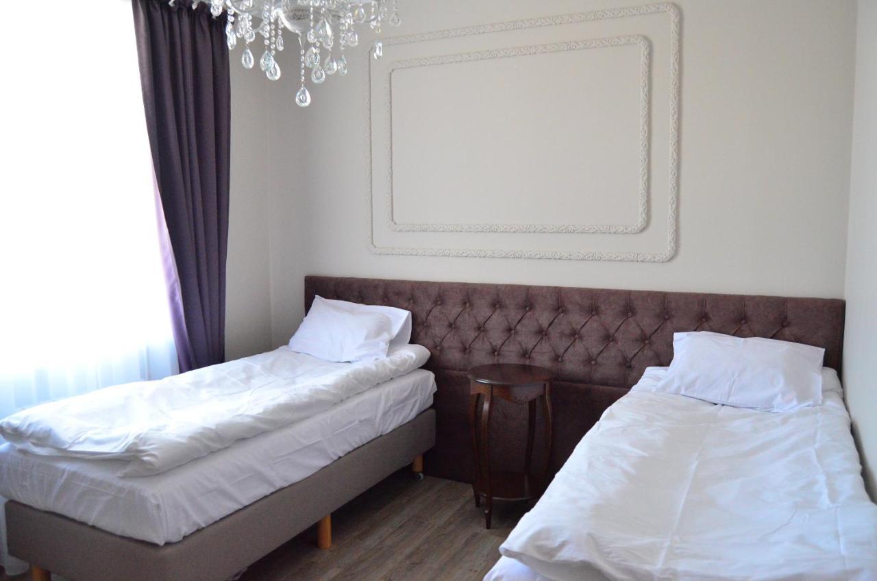 Golden Park Hotel Pavlodar Quarto foto